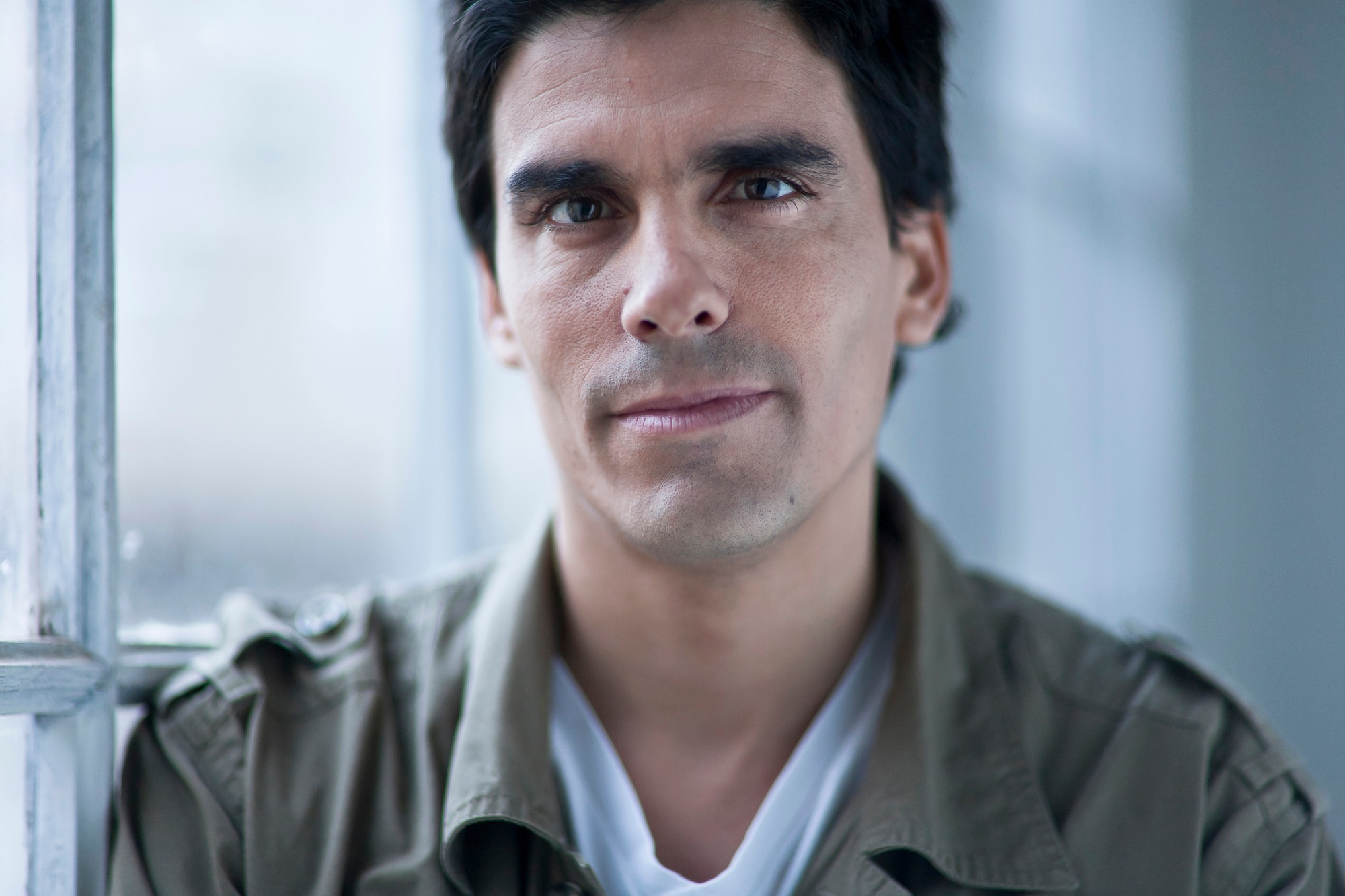 portrait of a man by a window